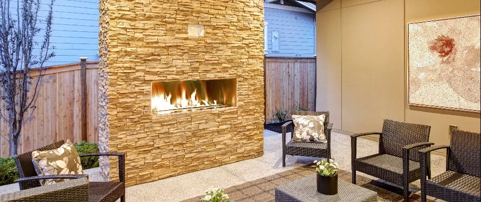 Gas-burning outdoor fireplace on a property in Cary, NC.