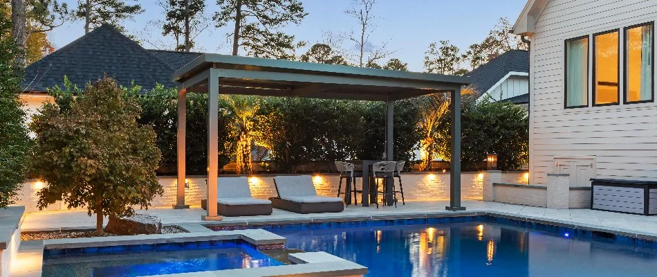 Metal pavilion over lounge chairs in Cary, NC.