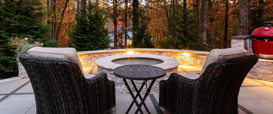 Two chairs in front of a fire pit in Neuse, NC.